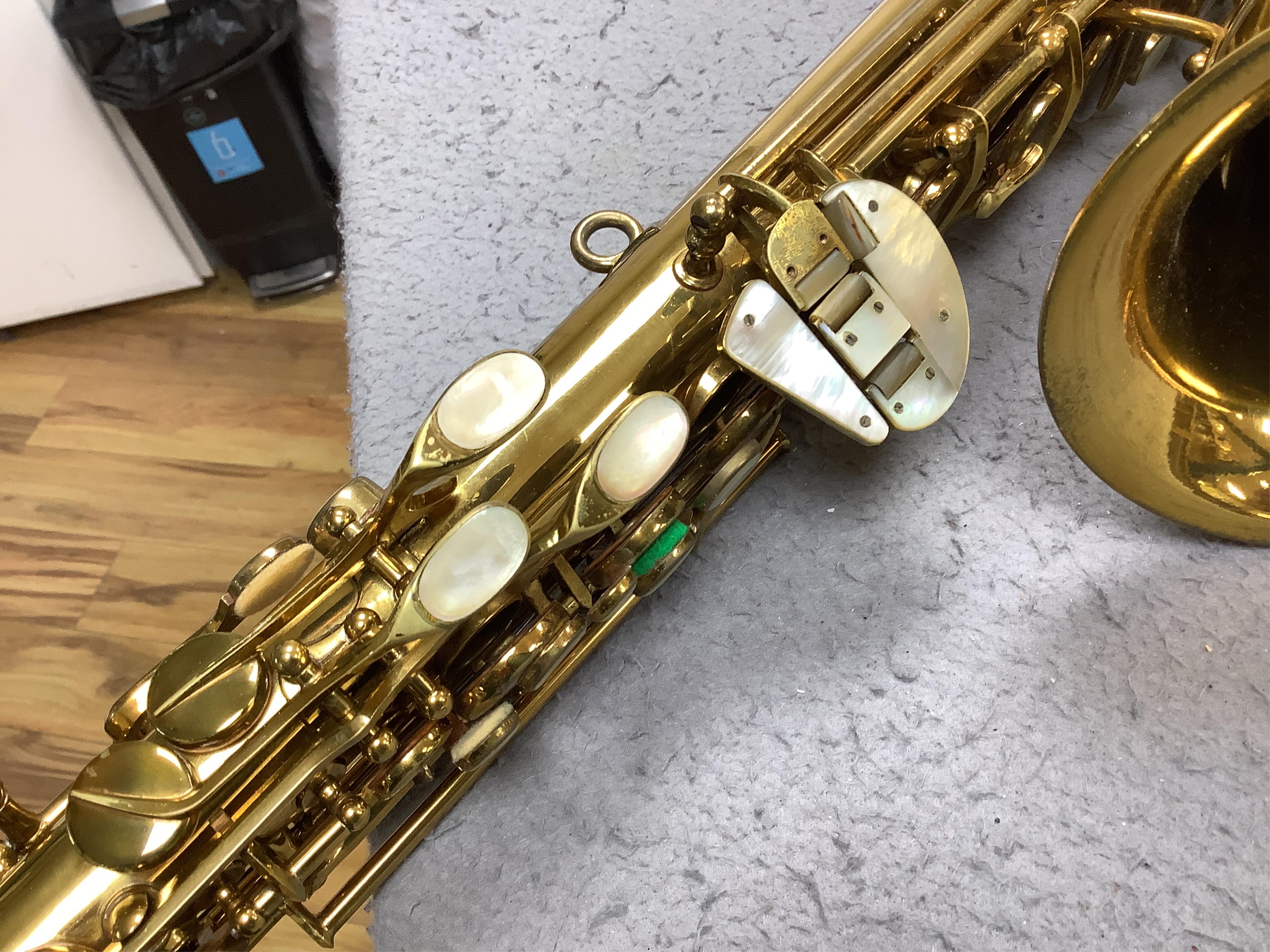 A cased Pennsylvania Special alto saxophone (pads are understood to have been replaced). Condition - fair to good.